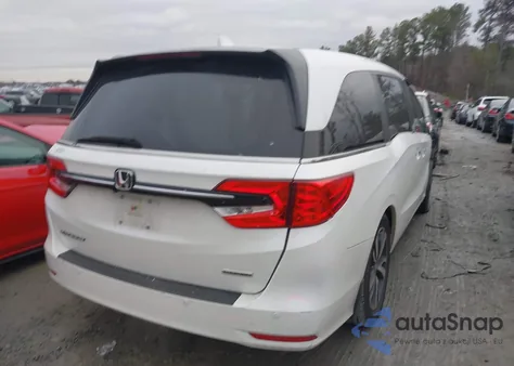 2021 Honda Odyssey Touring from USA, damaged, VIN 5FNRL6H8XMB011011